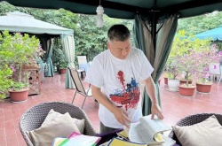 高考钉子户梁实第26次高考未过二本线，文综大失所望